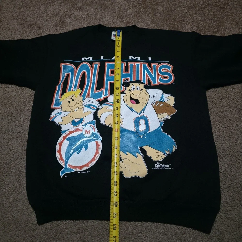 Vintage 1994 Miami Dolphins Flintstones Black NFL Football Sweater Men's Large‎